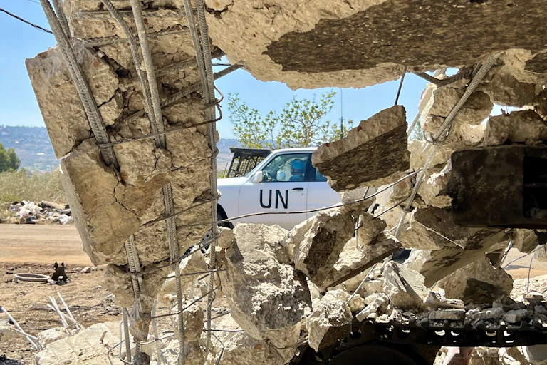 Unifil patrol vehicle photographer through the wreckage left by an Israeli airstrike in Deir Seryan Town in the Marjayoun District, southern Lebanon, 07 August 2025.
