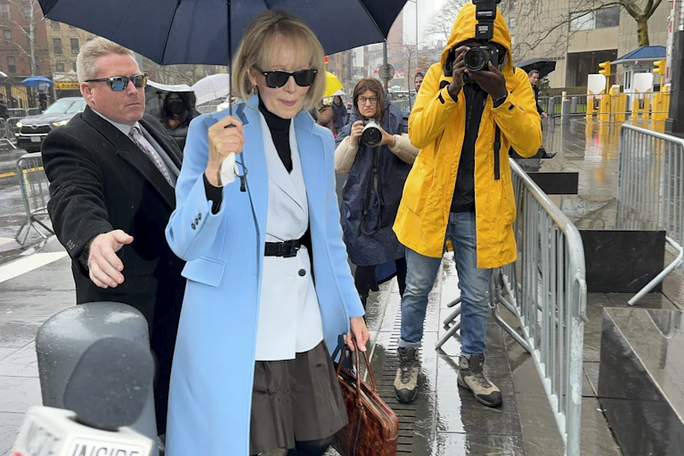 woman in a blue coat