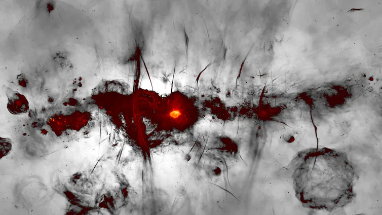 a red blotch against a grey background