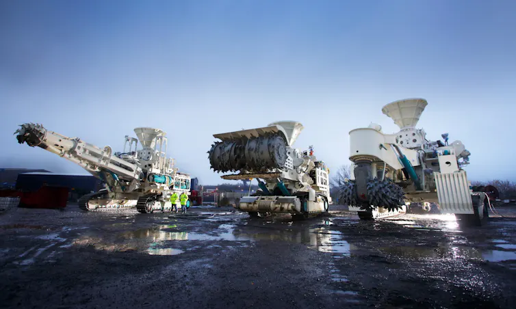 seabed mining vessels on land, large mining vehicles.