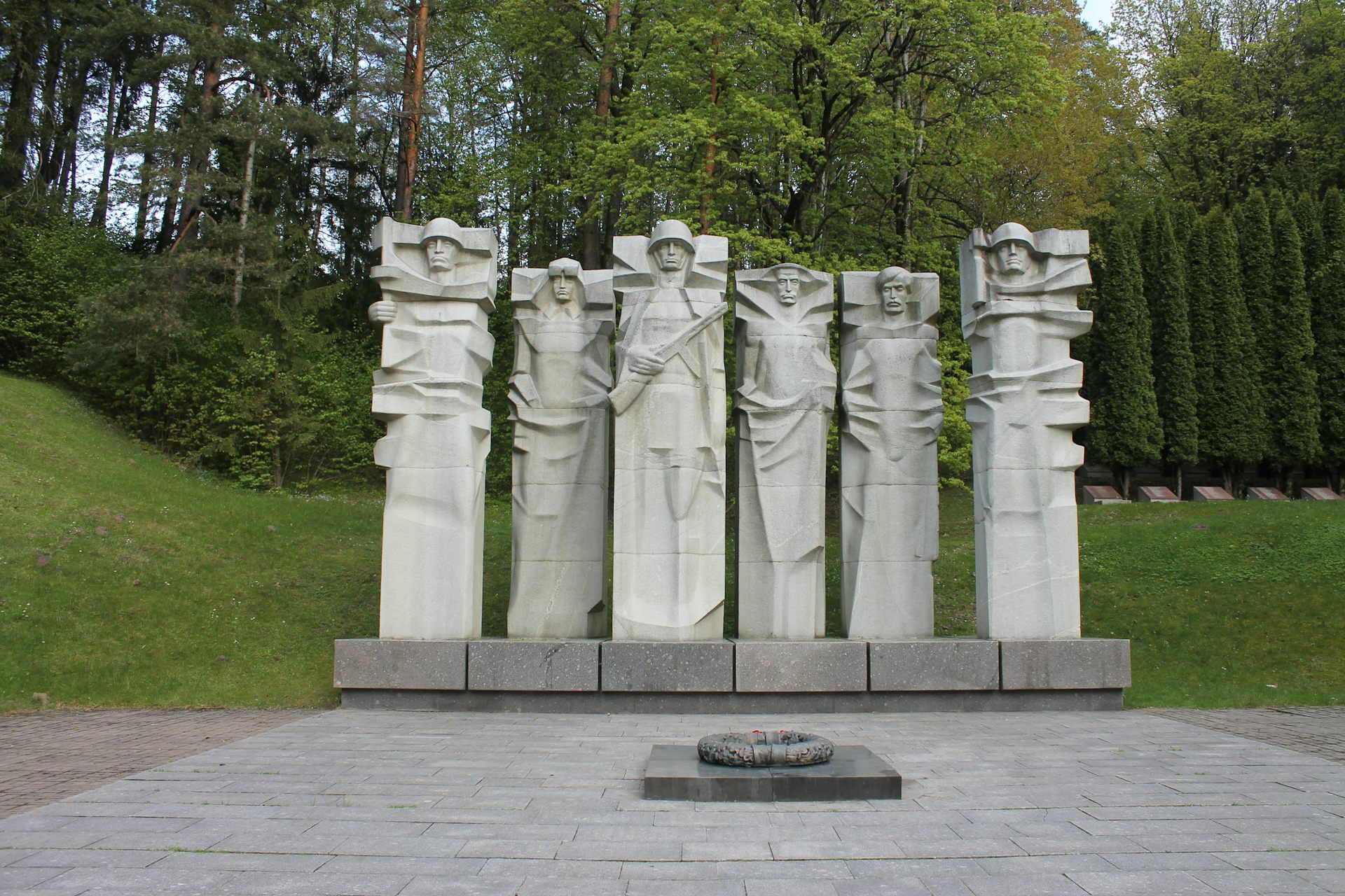 A Soviet monument featuring six granite statues of Red Army soldiers.