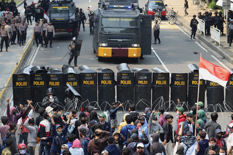 Indonesian Police sparks public anger after an excessive force against protesters and a killing of a motorcycle taxi driver.