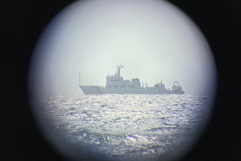 Warship apparently seen through a periscope viewfinder