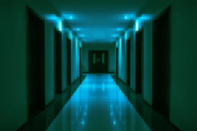 A blue lit corridor with pixellated edges, eerie unsettling vibe.