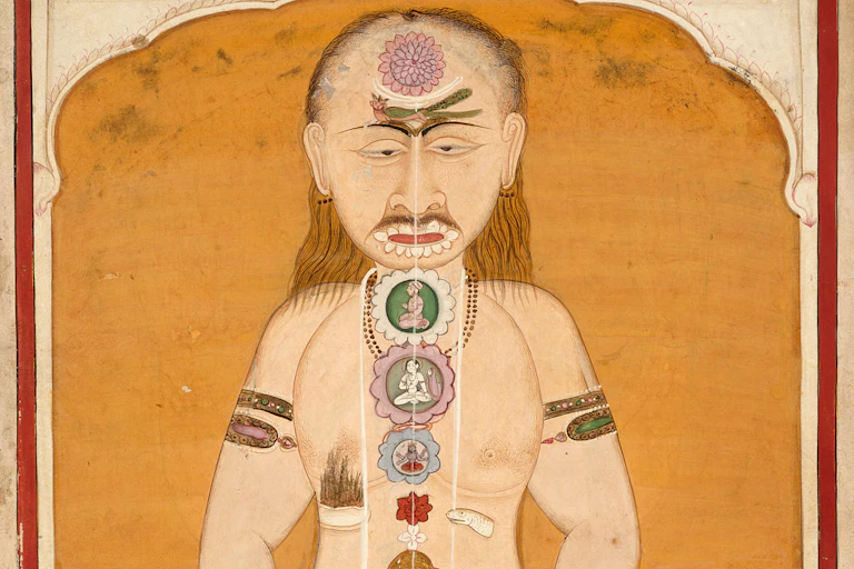 An old painting shows a figure in a yogic pose.