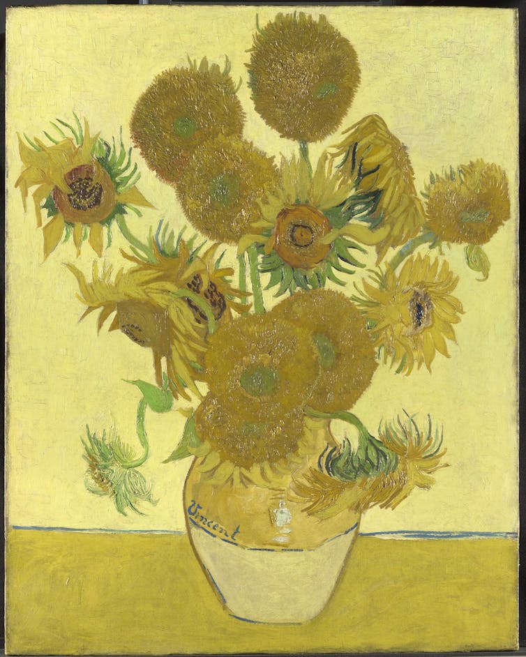 A yellow-hued painting from 1888 by Vincent Van Gogh called Sunflowers