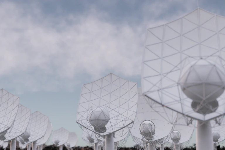 rows of white hexagonal satellite dishes