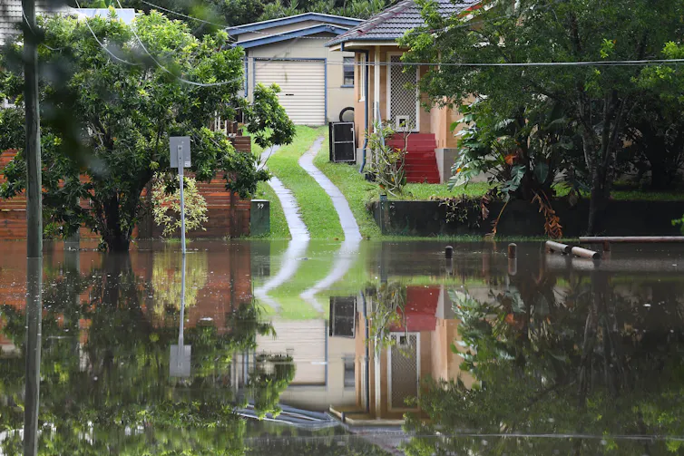 Flooded houses are seen in Oxley, in Brisbane