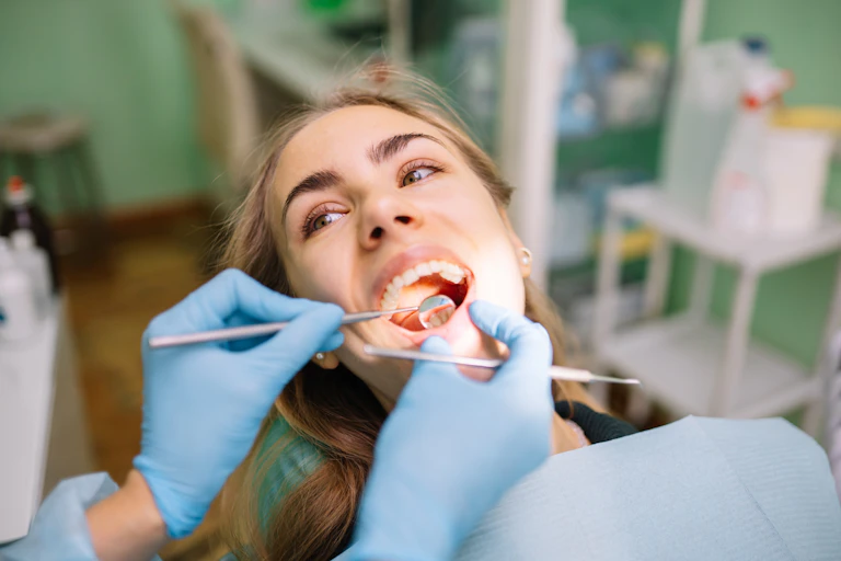 Woman has dental check up