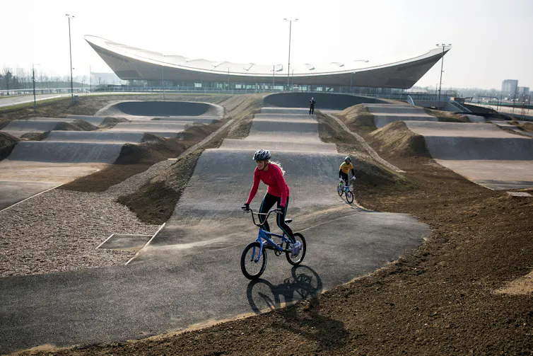 Cyclists ride the BMX track at the Velopark, formerly the cycling venue for the London 2012 Games.