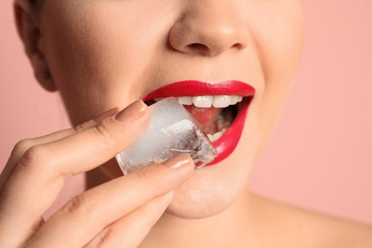 Person chewing ice.