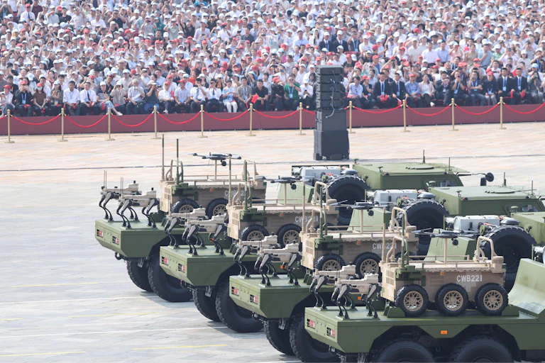 Chinese tanks parade with robot wolves