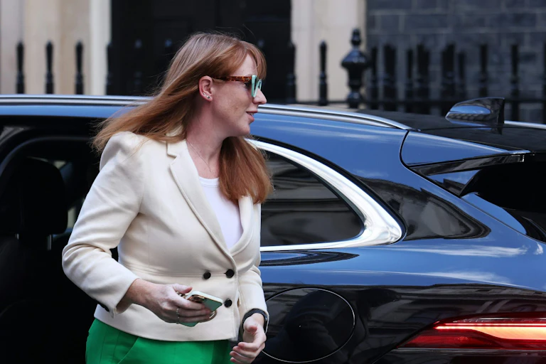 Angela Rayner getting out of a car.