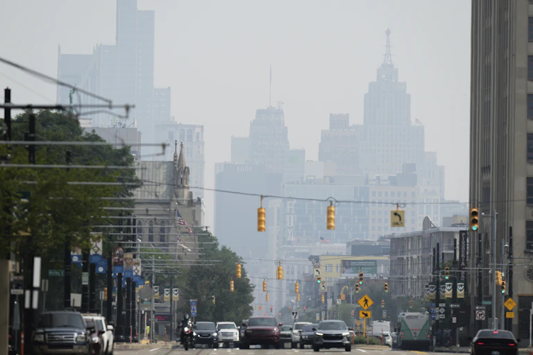 Tall buildings in a city skyline are grayed out