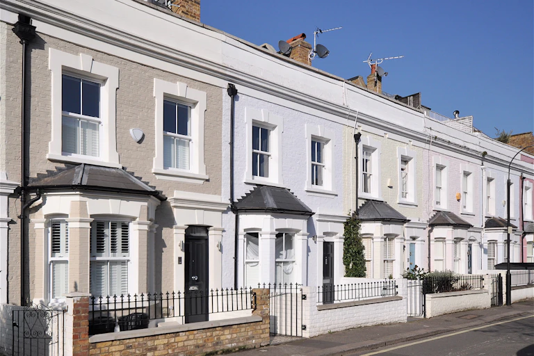 White and light grey painted homes