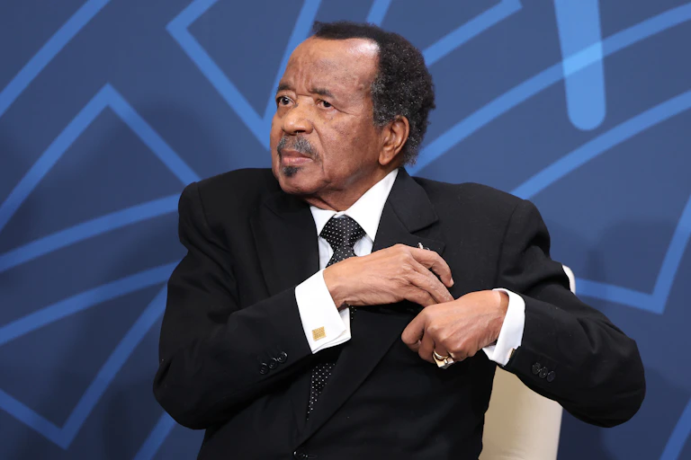 A man wearing a grey suit