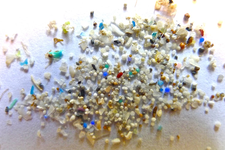 Small plastic shards and beads on a table