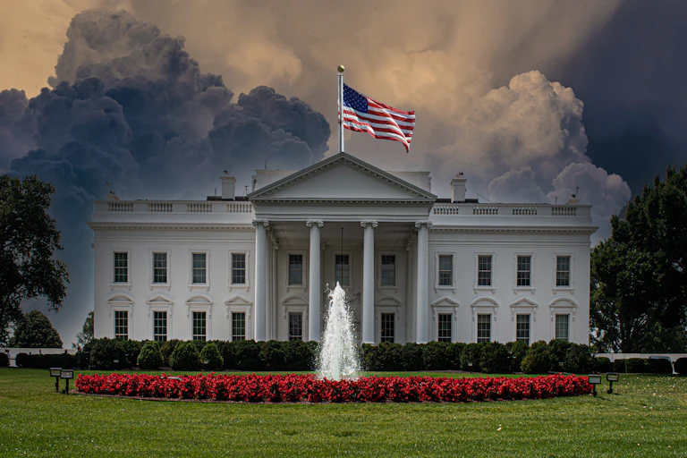 The White House, with a dark storm behind it.