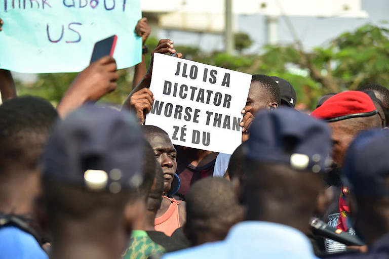 People holding up placards