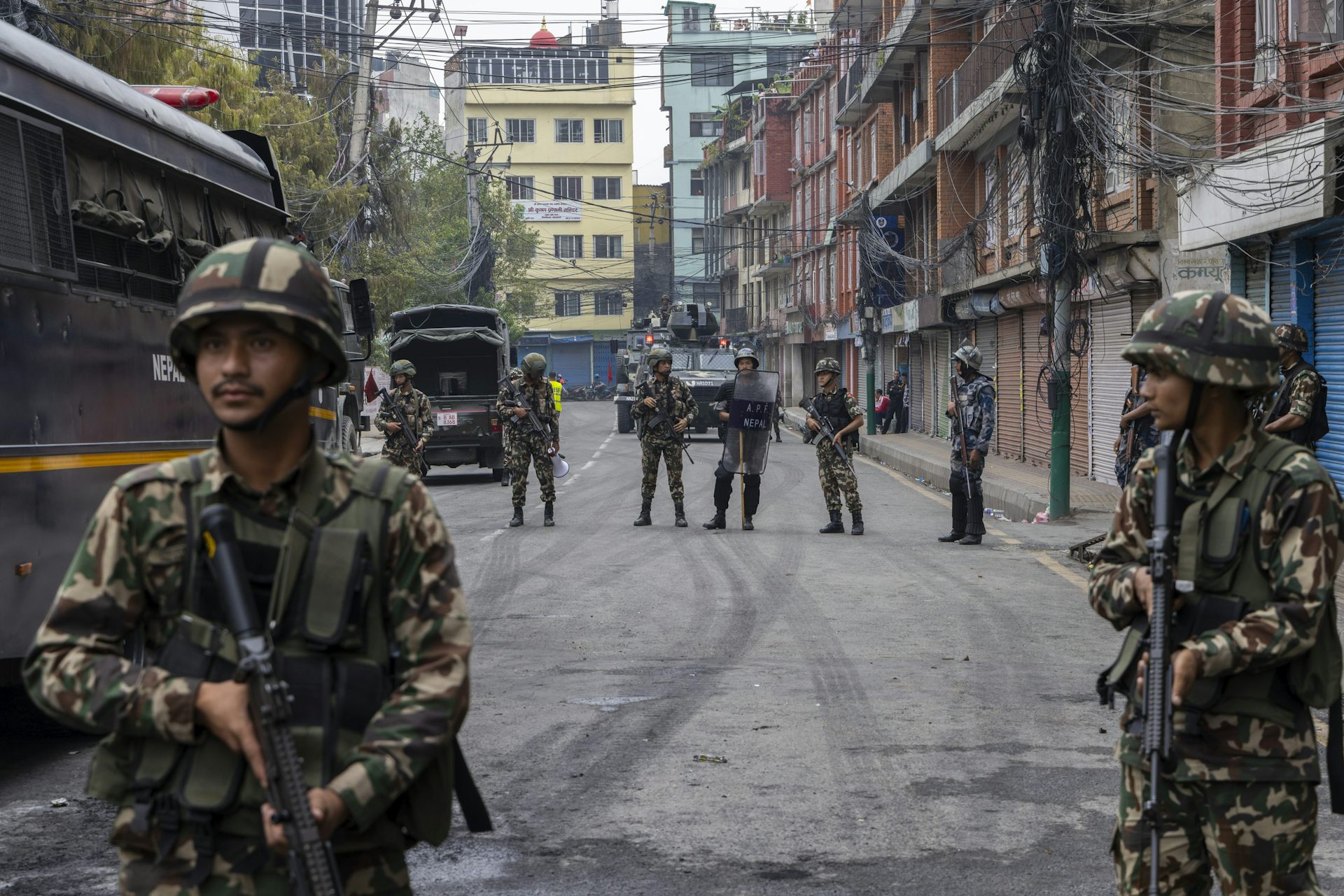 Nepalese troops standing guard on a street in Kathmandu.