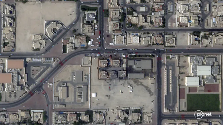 A satellite image shows the site of an airstrike.