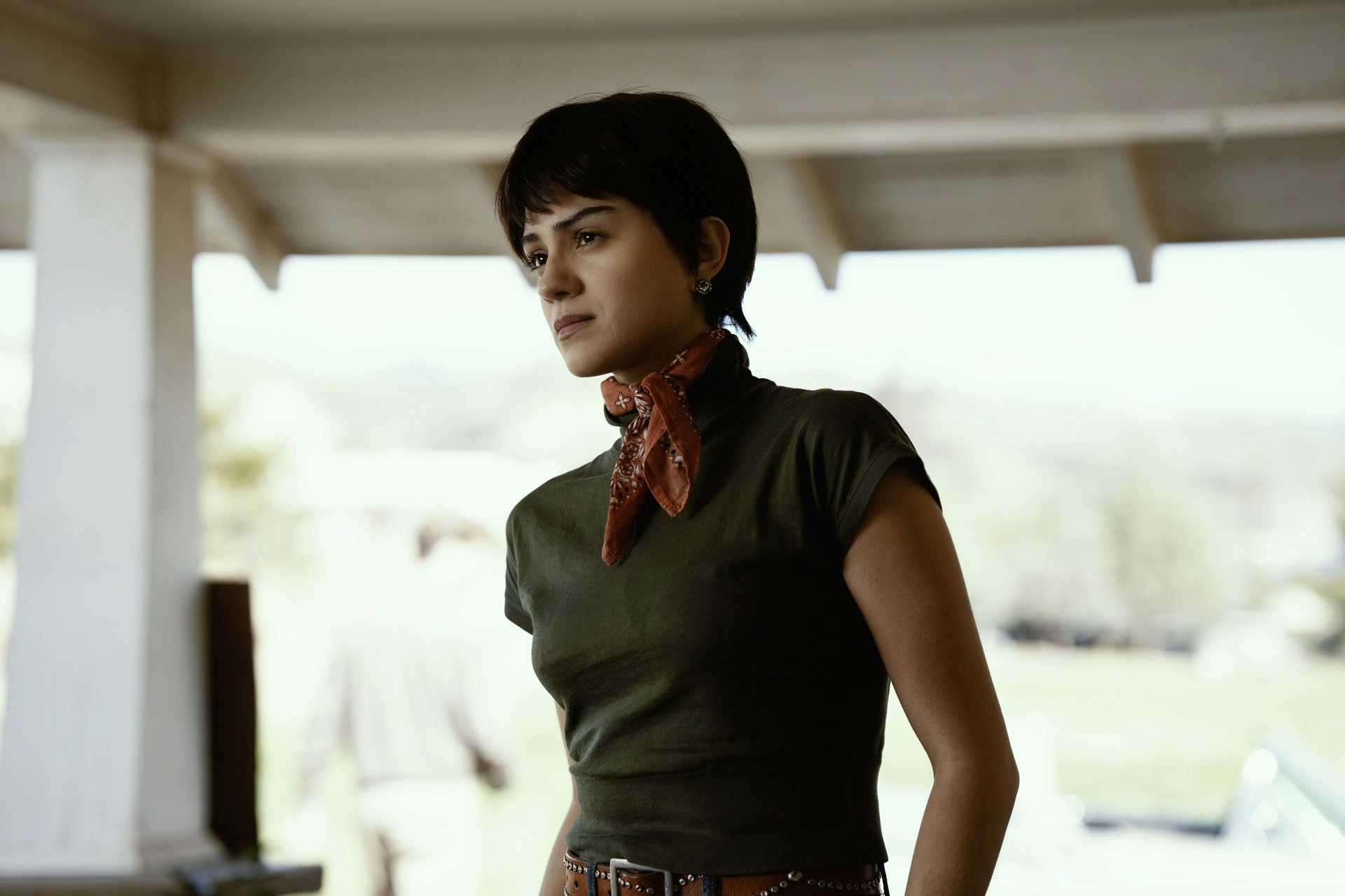 Sandra standing on a porch