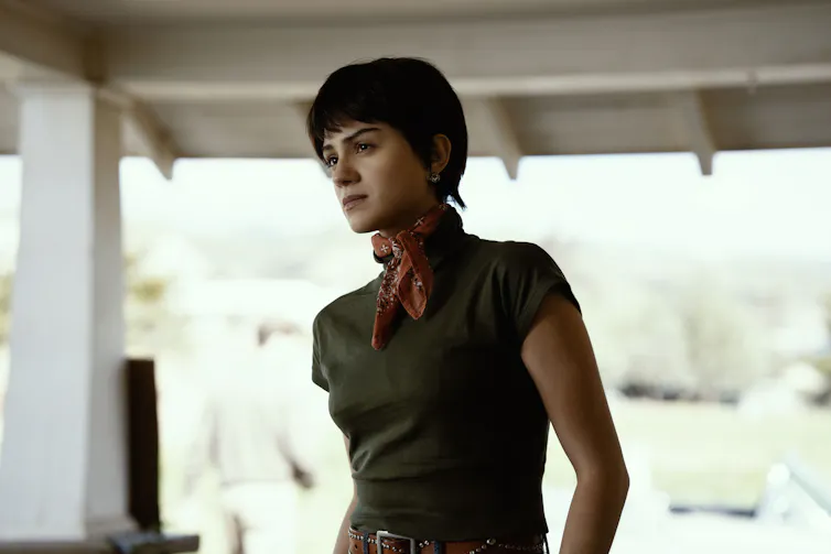 Sandra standing on a porch