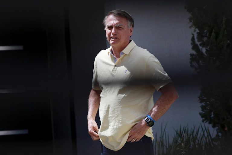Jair Bolsonaro inside the grounds of his residence.