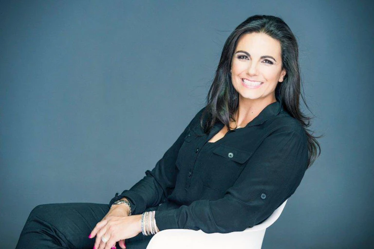 Seated smiling woman