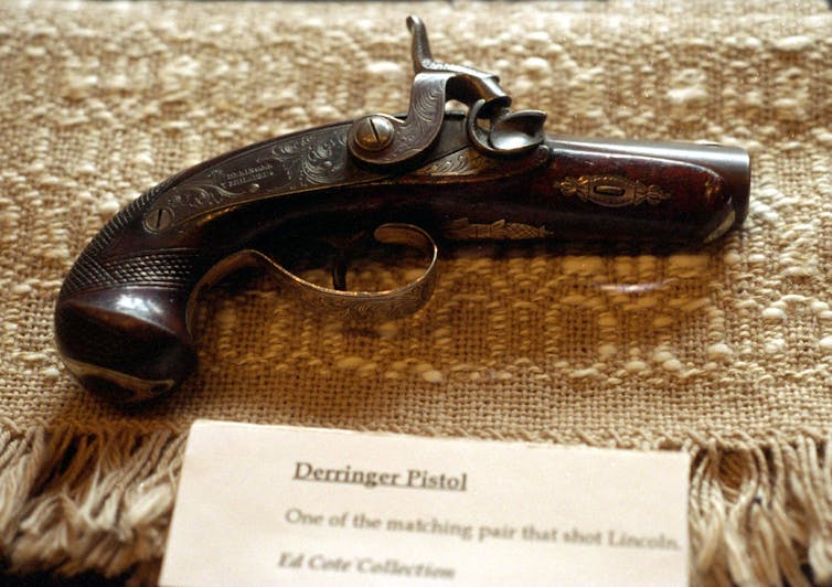 A small, antique pistol.