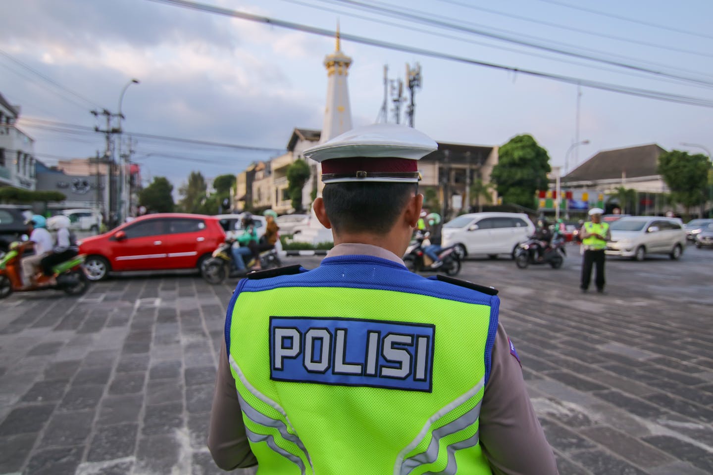 Indonesian police are involved in a riot with protesters.