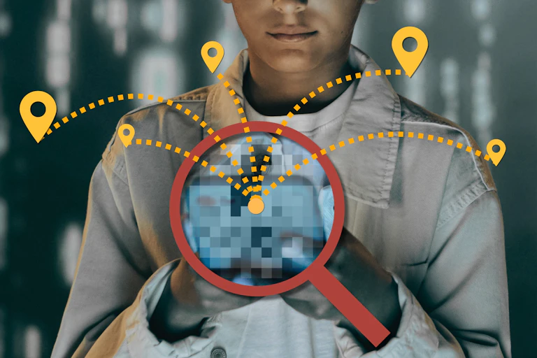 A magnifying glass looks at a child using a phone that is tracking them