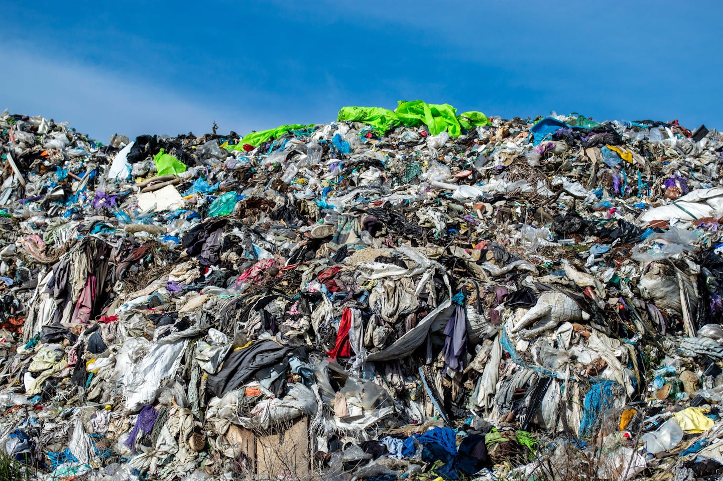 Huge pile of discarded clothing and fabrics.