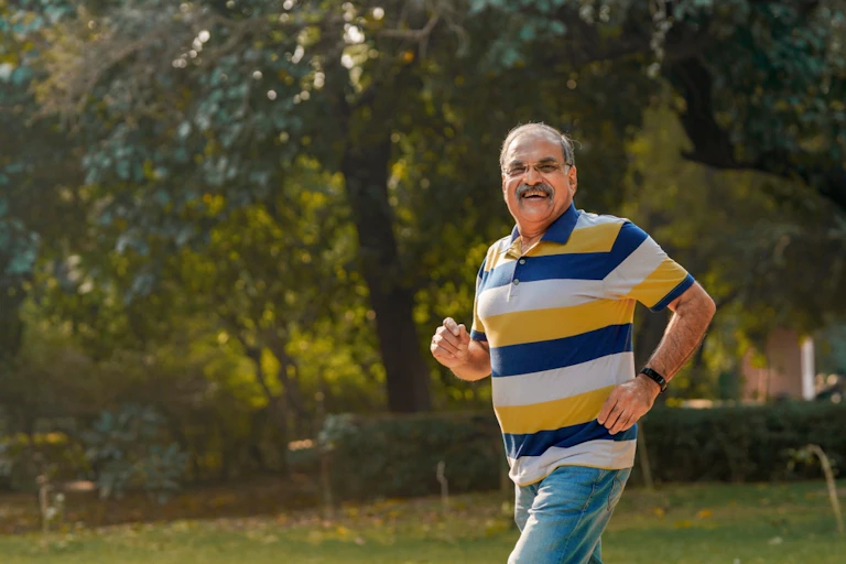 Slightly overweight middle-aged man running.