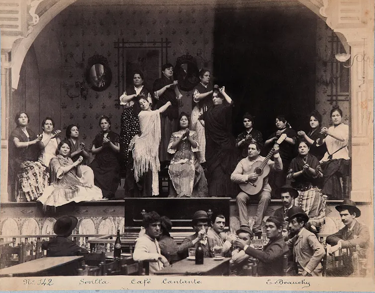 Fotografía de un café flamenco a finales del siglo 19.