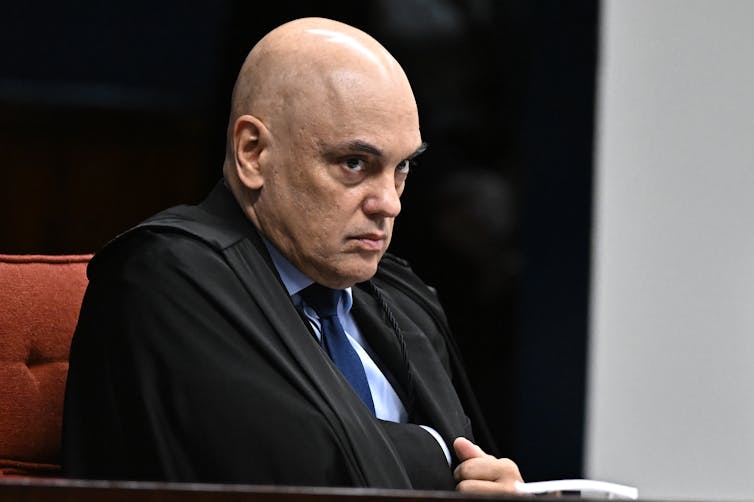 Why Brazilians had been so divided of their response to Bolsonaro’s conviction 1 Alexandre de Moraes sat in court.
