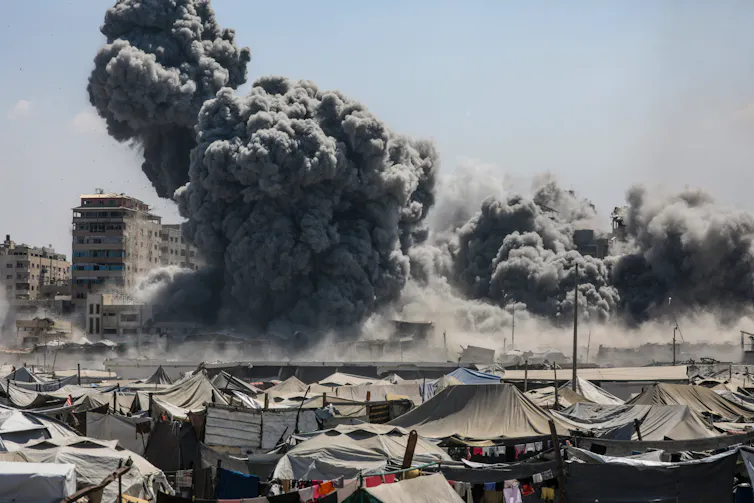 Smoke rises following an Israeli airstrike in Gaza City.