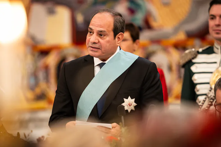 Abdel Fattah Al-Sisi delivers a speech during a gala dinner.