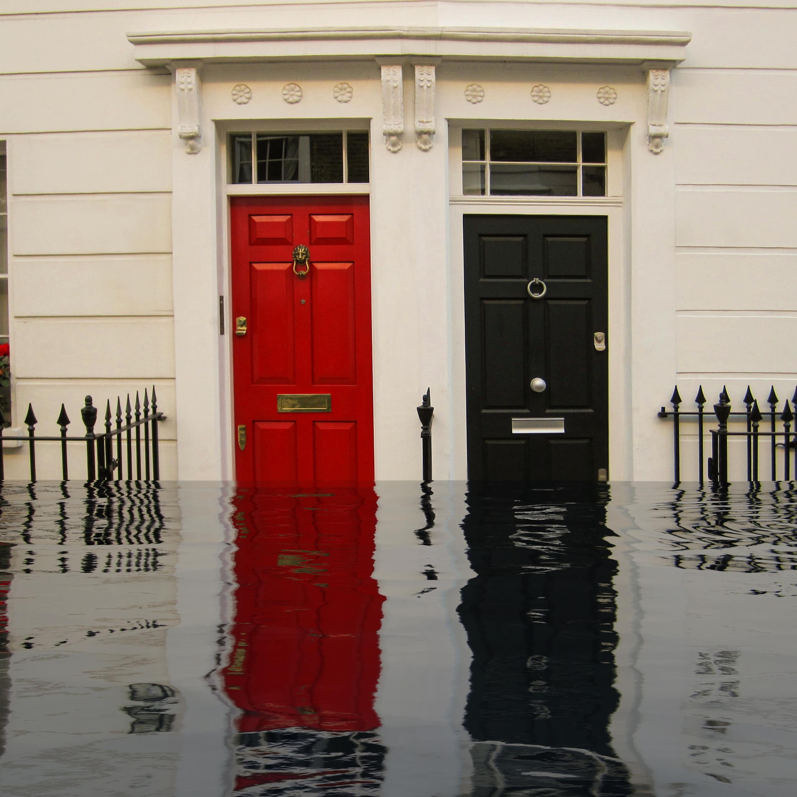 red and black front doors, exterior of homes with flooded street