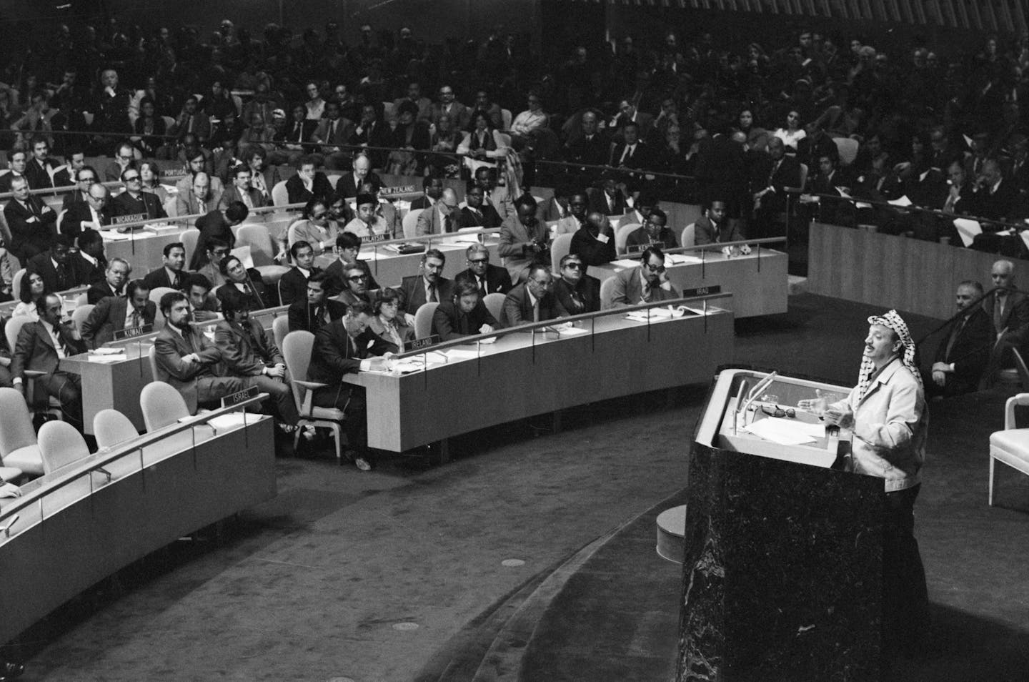 A man gives a speech before a crowd.
