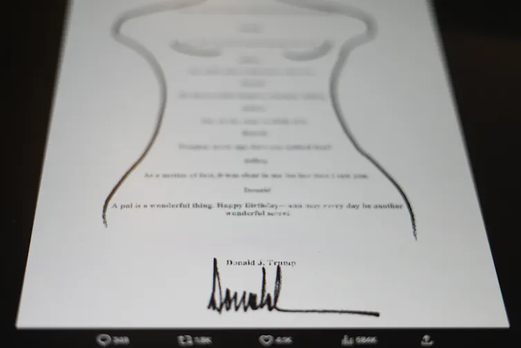 A silhouette of a woman's body drawn in black ink with blurry writing.