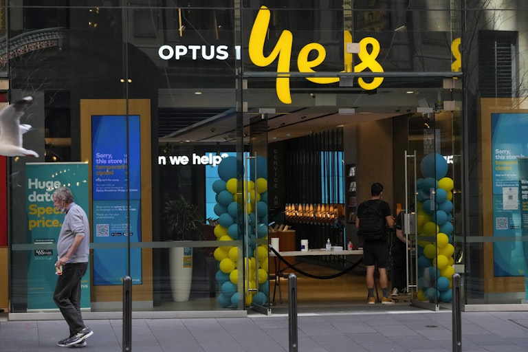 An Optus shopfront in a city.