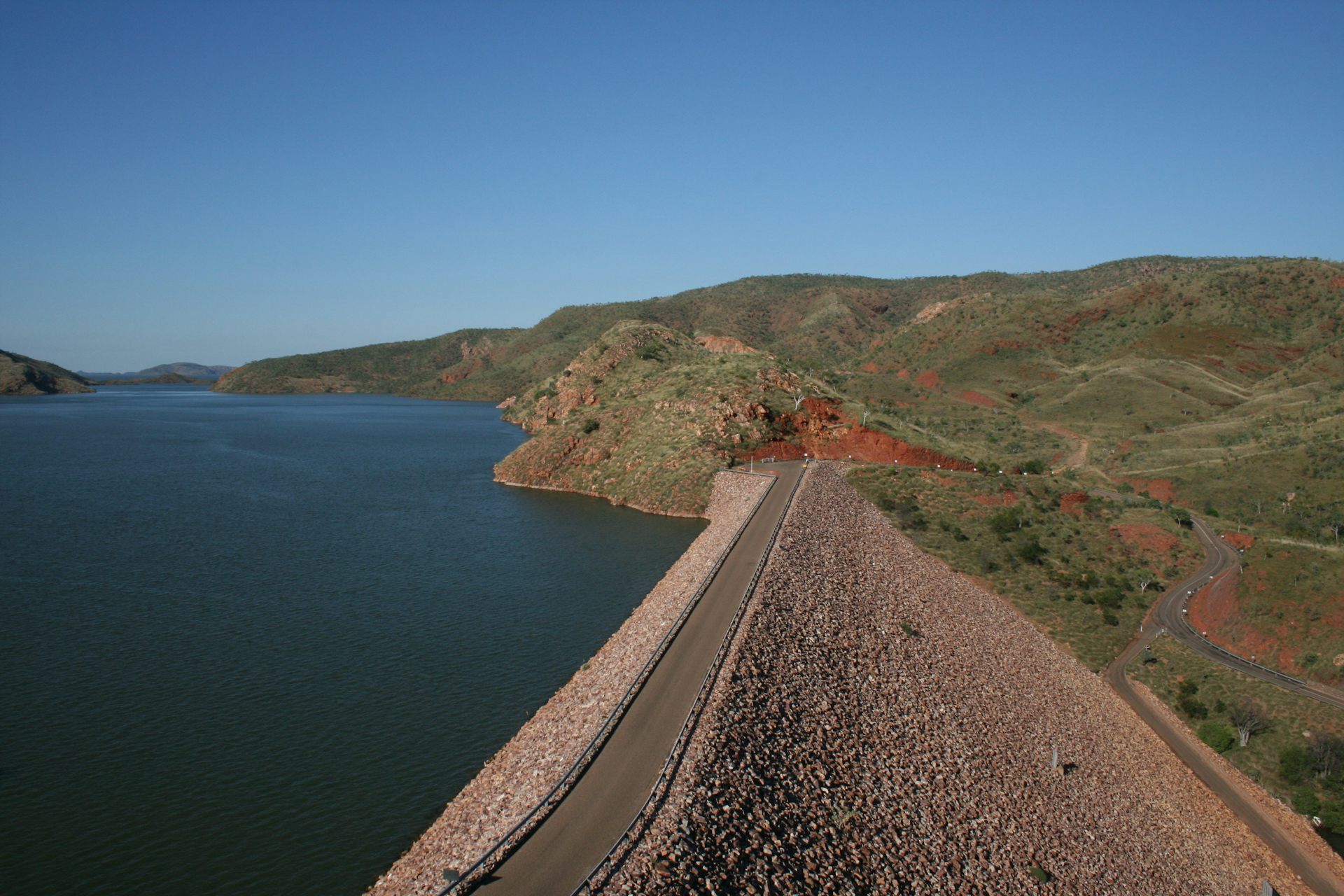 A dam surrounded by arid landscape
