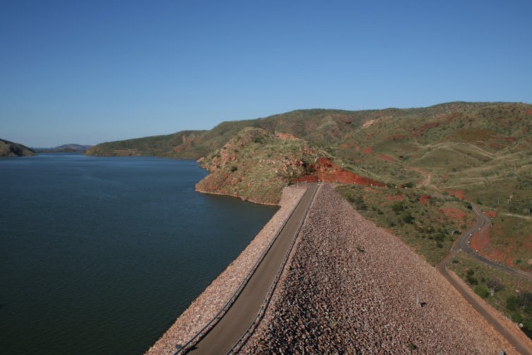 A dam surrounded by arid landscape