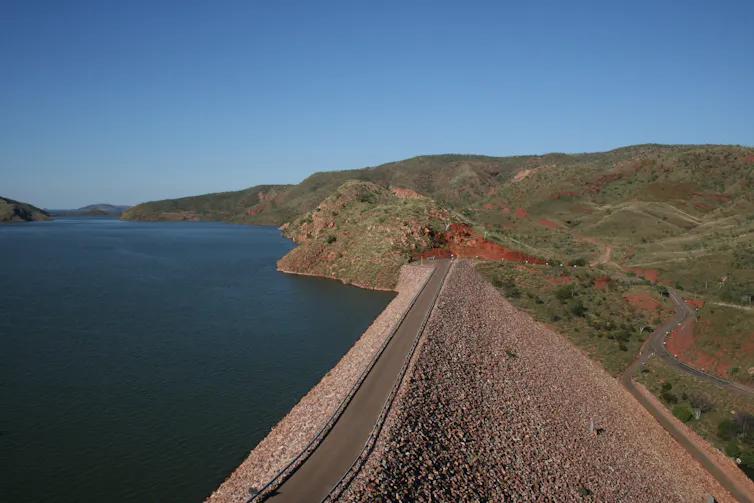 A dam surrounded by arid landscape