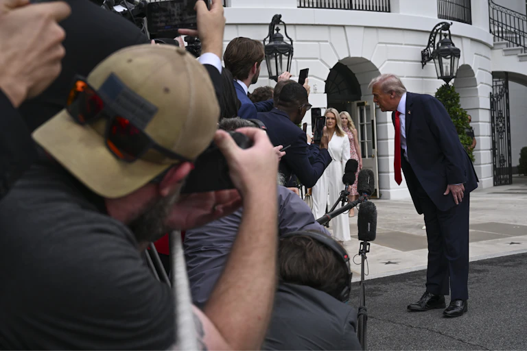 Donald Trump angles towards a media pack