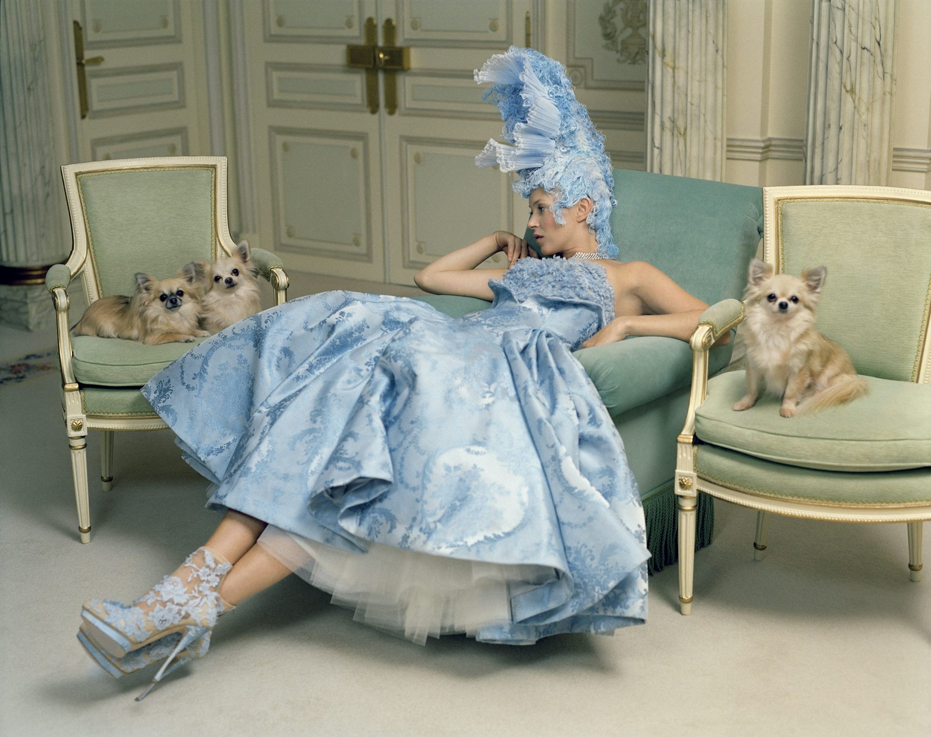 Kate Moss styled as Marie Antoinette in an Alexander McQueen outfit, Van Cleef and Arpels jewelry, and a hat by Julian d'Ys for Vogue US.