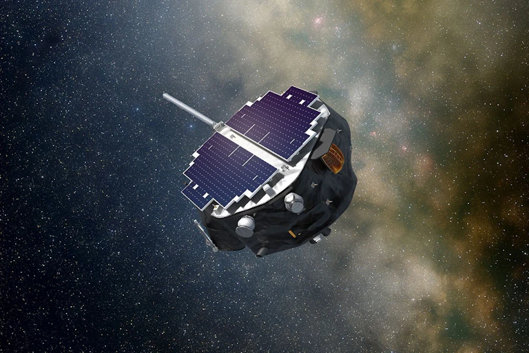 An illustration showing a spacecraft covered on one side with solar panels flying through space.