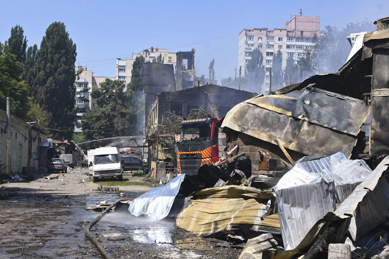 Damage caused in Kyiv by Russian military attacks.