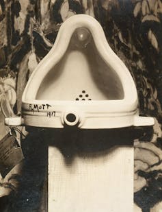 A urinal signed 'R.Mutt'.